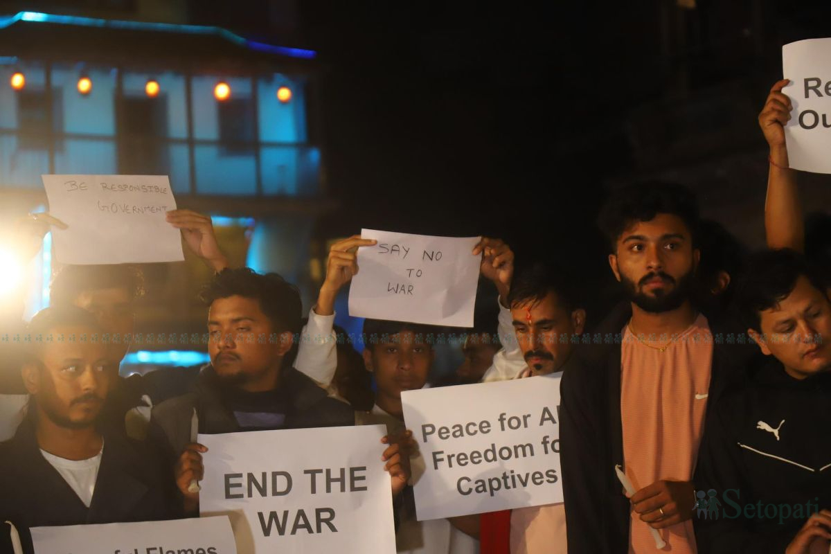 Students hold a candlelight vigil in memory of the Nepali students killed in Israel, at Patan Durbar Square in Lalitpur on October 9. (Nisha Bhandari/Setopati)