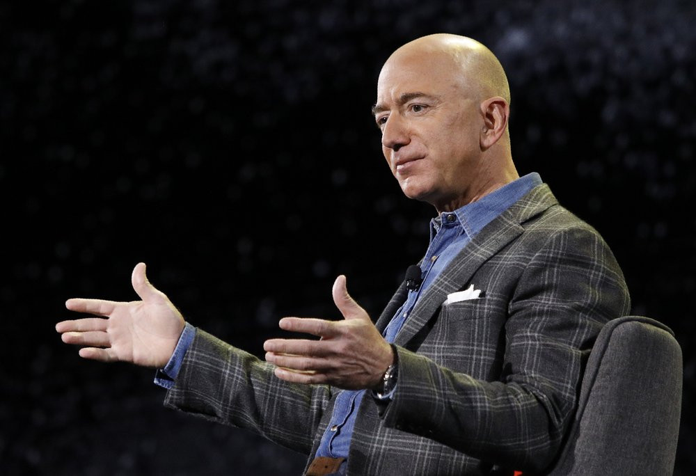 In this Thursday, June 6, 2019, file photo, Amazon CEO Jeff Bezos speaks at the Amazon re:MARS convention, in Las Vegas.