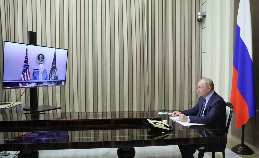 Russian President Vladimir Putin is shown during his talks with U.S. President Joe Biden via videoconference in the Bocharov Ruchei residence in the Black Sea resort of Sochi, Russia, Tuesday, Dec. 7, 2021.