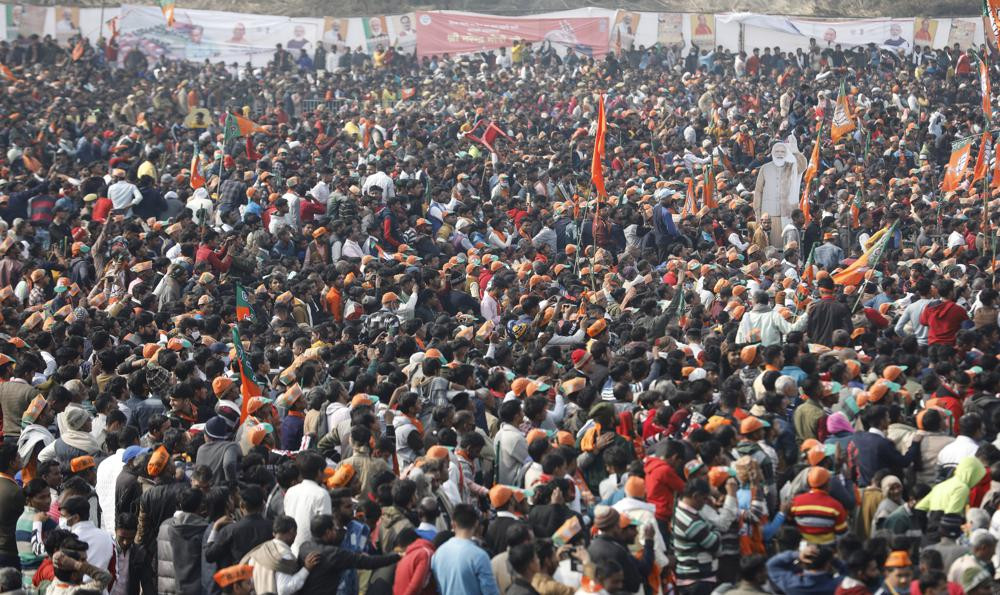 A crowd of supporters gather to listen to Indian Prime Minister Narendra Modi as he lays the foundation stone of Major Dhyan Chand Sports University in Meerut, Uttar Pradesh state on Jan. 2, 2022.