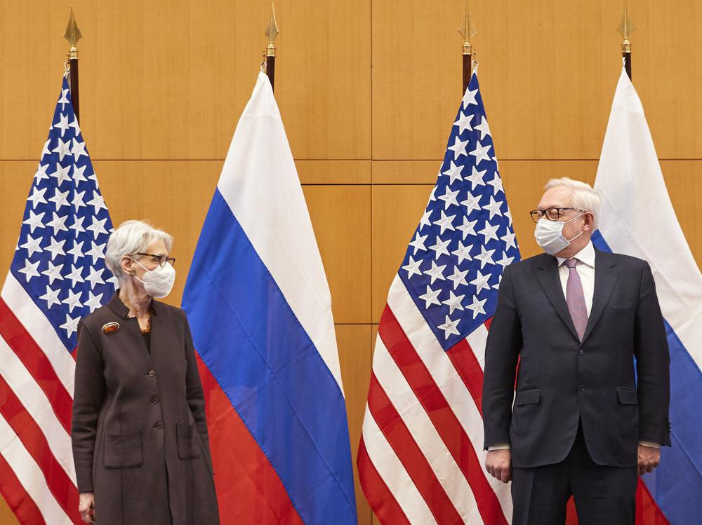 US Deputy Secretary of State Wendy Sherman, left, and Russian deputy foreign minister Sergei Ryabkov attend security talks at the United States Mission in Geneva, Switzerland, Monday, Jan. 10, 2022.
