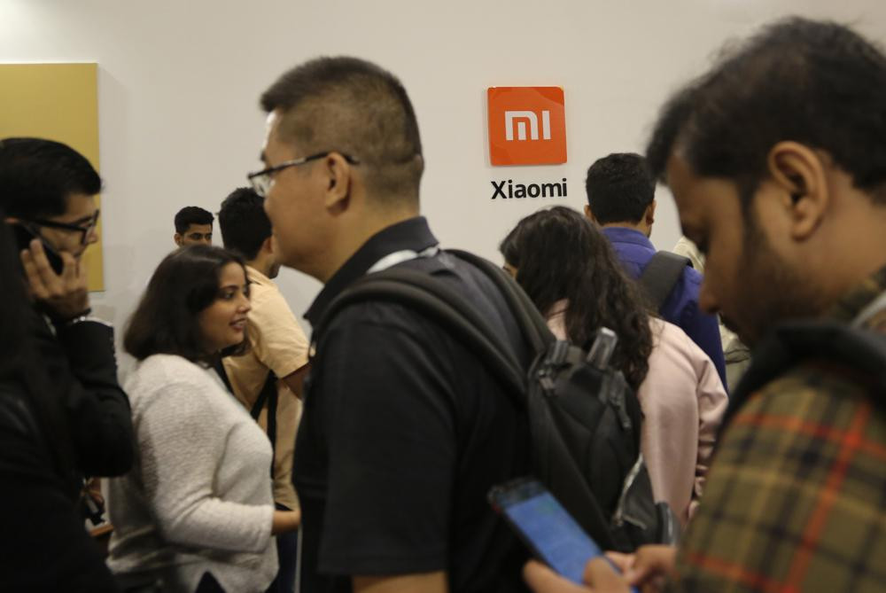 Guests gather to check out Xiaomi's newly launched products at an event in Bangalore, India, Tuesday, Sept. 17, 2019.
