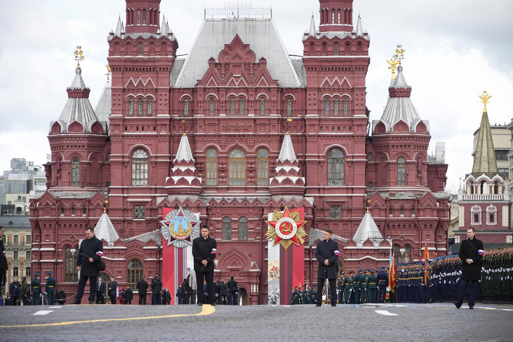 Security guards stand on Red Square prior to the Victory Day military parade in Moscow, Russia, Monday, May 9, 2022, marking the 77th anniversary of the end of World War II.