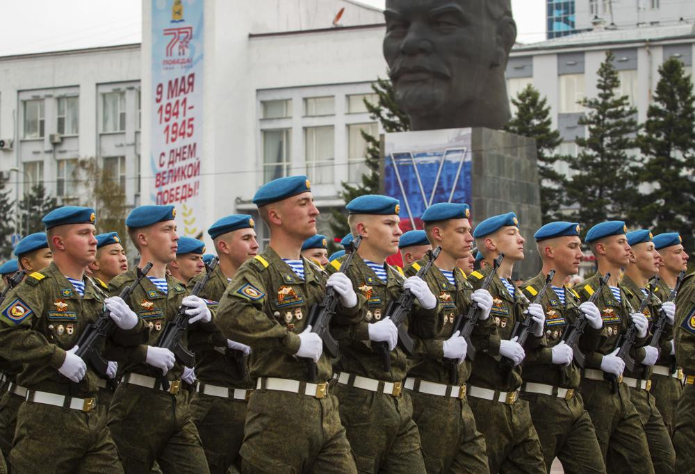 Russian servicemen march during the Victory Day military parade in Ulan-Ude, the regional capital of Buryatia, a region near the Russia-Mongolia border, Russia, Monday, May 9, 2022, marking the 77th anniversary of the end of World War II.