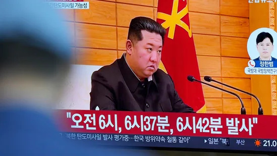 A TV screen shows a news program reporting about North Korea's missile launch with a file footage of North Korean leader Kim Jong Un, at a train station in Seoul, South Korea, Wednesday.