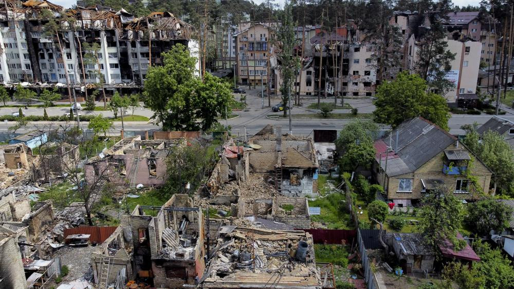 Damaged buildings ruined by attacks are seen in Irpin, on the outskirts of Kyiv, Ukraine, Thursday, May 26, 2022.