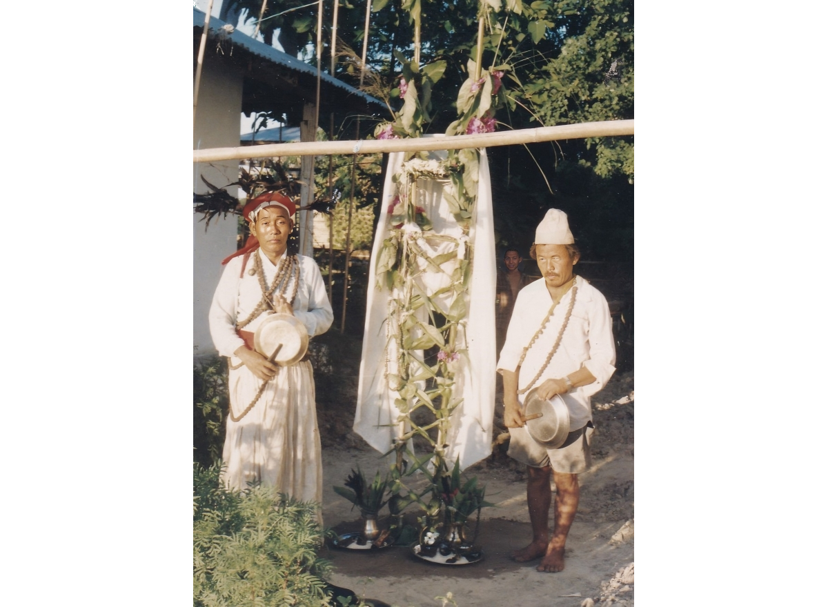 My father Tek Bahadur Lingden posing for a photo as a Yeba with his Yagapsiba (assistant) in around 2000s