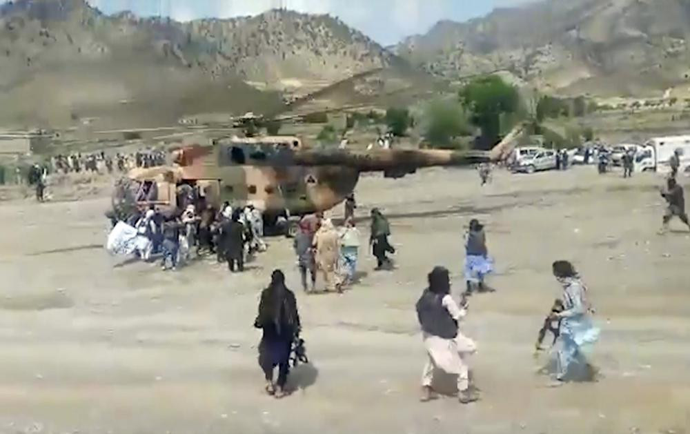 In this image taken from video from Bakhtar State News Agency, Taliban fighters secure a government helicopter to evacuate injured people in Gayan district, Paktika province, Afghanistan, Wednesday, June 22, 2022. AP/RSS Photo