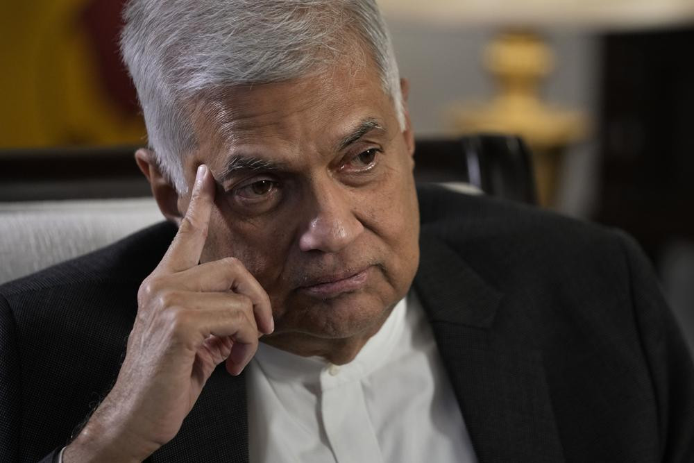 FILE - Sri Lanka's new Prime Minister Ranil Wickremesinghe gestures during an interview with The Associated Press in Colombo, Sri Lanka, Saturday, June 11, 2022.  AP/RSS Photo