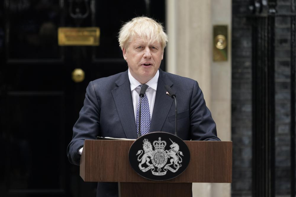 British Prime Minister Boris Johnson speaks to media next to 10 Downing Street in London, Thursday, July 7, 2022. (AP Photo/RSS)