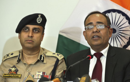 Government spokesperson Rohit Kansal, right, speaks as Swayam Prakash Pani, Inspector General of Kashmir Police sits beside him in Srinagar, Kashmir on Saturday.