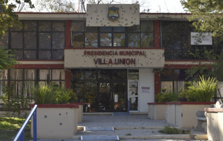 The City Hall of Villa Union is riddled with bullet holes after a gun battle between Mexican security forces and suspected cartel gunmen, Saturday, Nov. 30, 2019.