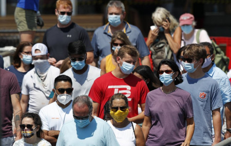 In this July 30, 2020, file photo, passengers board a Casco Bay Lines ferry bound for Peaks Island in Portland, Maine.