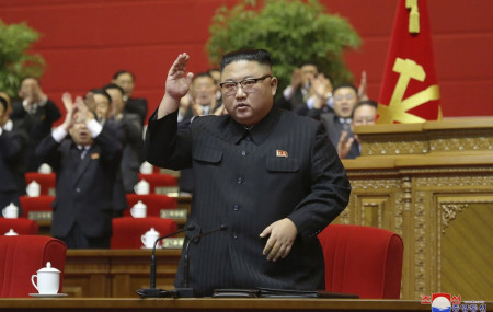 In this photo provided by the North Korean government, North Korean leader Kim Jong Un acknowledges to the applauds after he made his closing remarks at a ruling party congress in Pyongyang, North Korea Tuesday, Jan. 12, 2021.