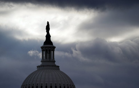 The Statue of Freedom by Thomas Crawford, atop the dome of the U.S. Capitol, is shown ahead of the inauguration of President-elect Joe Biden and Vice President-elect Kamala Harris, Sunday, Jan. 17, 2021, in Washington.