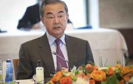 China's Foreign Minister Wang Yi talks during a meeting with Turkey's Foreign Minister Mevlut Cavusoglu, in Ankara, Turkey, Thursday, March 25, 2021.