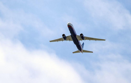 In this file photo taken on Friday, April 26, 2019, A Russian Air Force Tu-214 flies over Offutt Air Force Base, Friday, April 26, 2019, in Omaha, Nebraska.