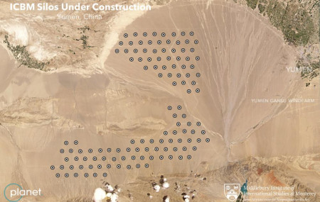 This June 4, 2021, satellite image provided by Planet Labs Inc. shows what analysts believe is a field of intercontinental ballistic missile silos near Yumen, China.