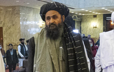 In this March 18, 2021, file photo, Taliban co-founder Mullah Abdul Ghani Baradar, arrives with other members of the Taliban delegation for an international peace conference in Moscow, Russia.
