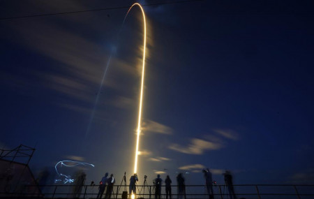 A SpaceX Falcon 9 rocket, with four private citizens onboard, lifts off in this time-exposure photo from Kennedy Space Center's Launch Pad 39-A, Wednesday, Sept. 15, 2021, in Cape Canaveral, Florida.