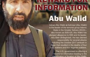 This undated image provided by Rewards For Justice shows a wanted posted of Adnan Abu Walid al-Sahrawi, the leader of Islamic State in the Greater Sahara.