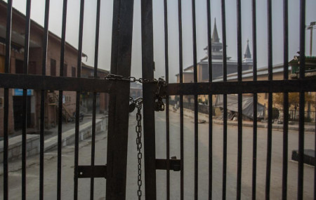 Kashmir's Jamia Masjid, or the grand mosque is seen through its gate that remains locked on Fridays in Srinagar, Indian controlled Kashmir, Nov. 26, 2021.