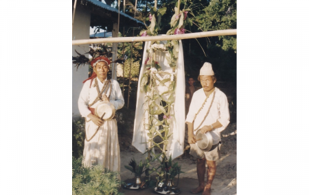 My father Tek Bahadur Lingden posing for a photo as a Yeba with his Yagapsiba (assistant) in around 2000s