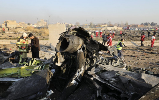 In this Wednesday, Jan. 8, 2020 file photo debris at the scene where a Ukrainian plane crashed in Shahedshahr southwest of the capital Tehran, Iran.