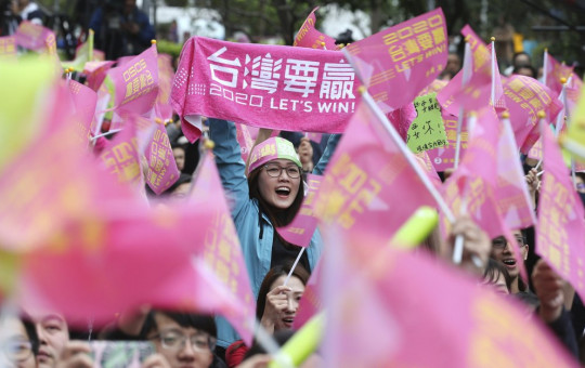 Supporters of Taiwan's presidential election candidate, Taiwan president Tsai Ing-wen cheer for Tsai's victory in Taipei, Taiwan, Saturday, Jan. 11, 2020.