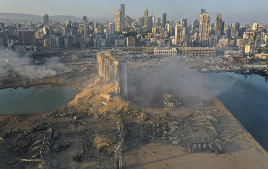 A drone picture shows the scene of an explosion at the seaport of Beirut, Lebanon, Wednesday, Aug. 5, 2020.