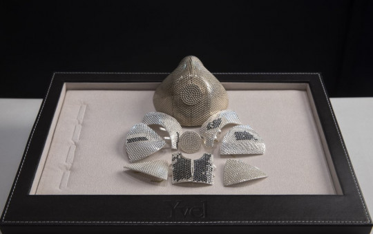 Parts and a model of a mask is displayed in the Israeli jewelry company Yvel in Motza near Jerusalem, Sunday, Aug. 9, 2020.