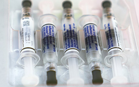 This Saturday, Oct. 17, 2020 file photo shows influenza vaccine syringes at the L.A. Care Health Plan and Blue Shield of California Promise Health Plan's Community Resource Center's Free Drive-Thru vaccination event in Los Angeles.