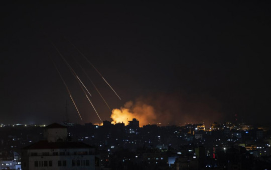 Smoke rises following Israeli missile strikes on Gaza City, Thursday, May 13, 2021.
