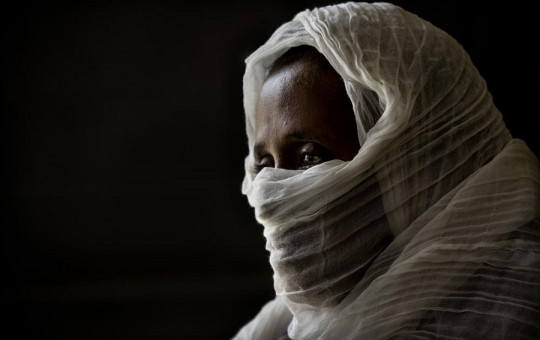 A 40-year-old woman who was says she was held captive and repeatedly raped by 15 Eritrean soldiers over a period of a week in a remote village near the Eritrea border.