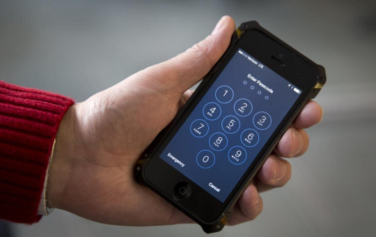 In this Feb. 17, 2016, file photo an iPhone is seen in Washington.