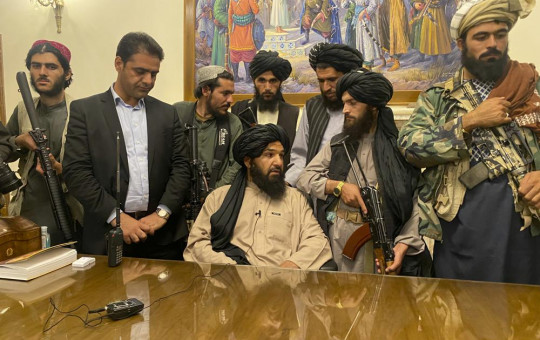 Taliban fighters take control of Afghan presidential palace after the Afghan President Ashraf Ghani fled the country, in Kabul, Afghanistan, Sunday, Aug. 15, 2021.