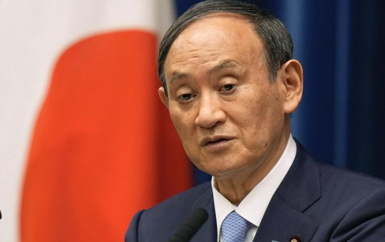 In this Aug. 17, 2021, file photo, Japanese Prime Minister Yoshihide Suga speaks during a news conference at prime minister's official residence in Tokyo.