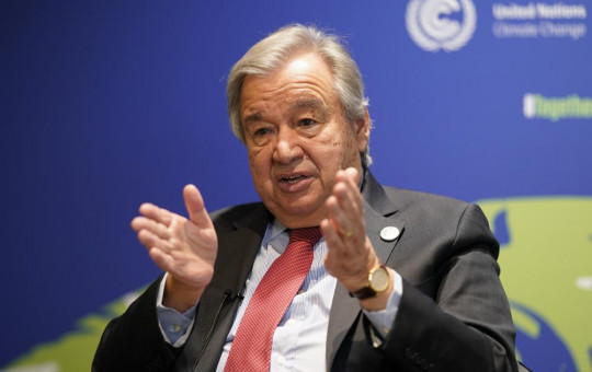 UN Secretary-General Antonio Guterres gestures during an interview at the COP26 U.N. Climate Summit in Glasgow, Scotland, Thursday, Nov. 11, 2021.