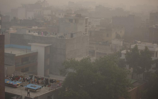 Morning haze and smog envelops the skyline in New Delhi, India, Friday, Nov. 5, 2021.