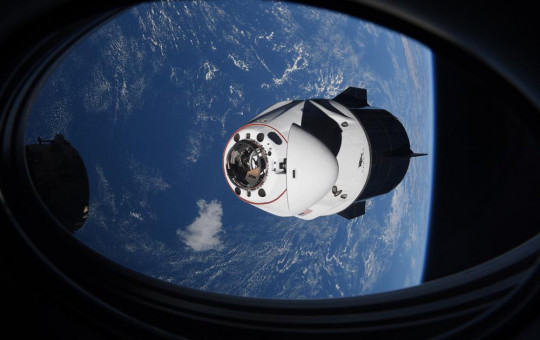 In this April 24, 2021 file photo made available by NASA, the SpaceX Crew Dragon capsule approaches the International Space Station for docking.