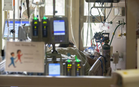 A pregnant and intubated COVID-19 patient sits in the Surgical Intensive care unit (SICU) at St. Luke's Boise Medical Center in Boise, Idaho on Tuesday, Aug. 31, 2021.