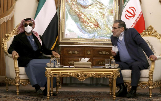 Secretary of Iran's Supreme National Security Council Ali Shamkhani, right, speaks with United Arab Emirates' top national security adviser Sheikh Tahnoon bin Zayed Al Nahyan during their meeting in Tehran, Iran, Monday, Dec. 6, 2021.