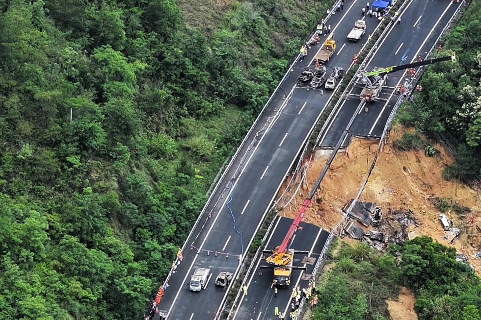 In this photo released by Xinhua News Agency, an aerial photo shows rescuers work at the site of a collapsed road section of the Meizhou-Dabu Expressway in Meizhou, south China’s Guangdong Province, Wednesday, May 1, 2024. (Xinhua News Agency via AP)