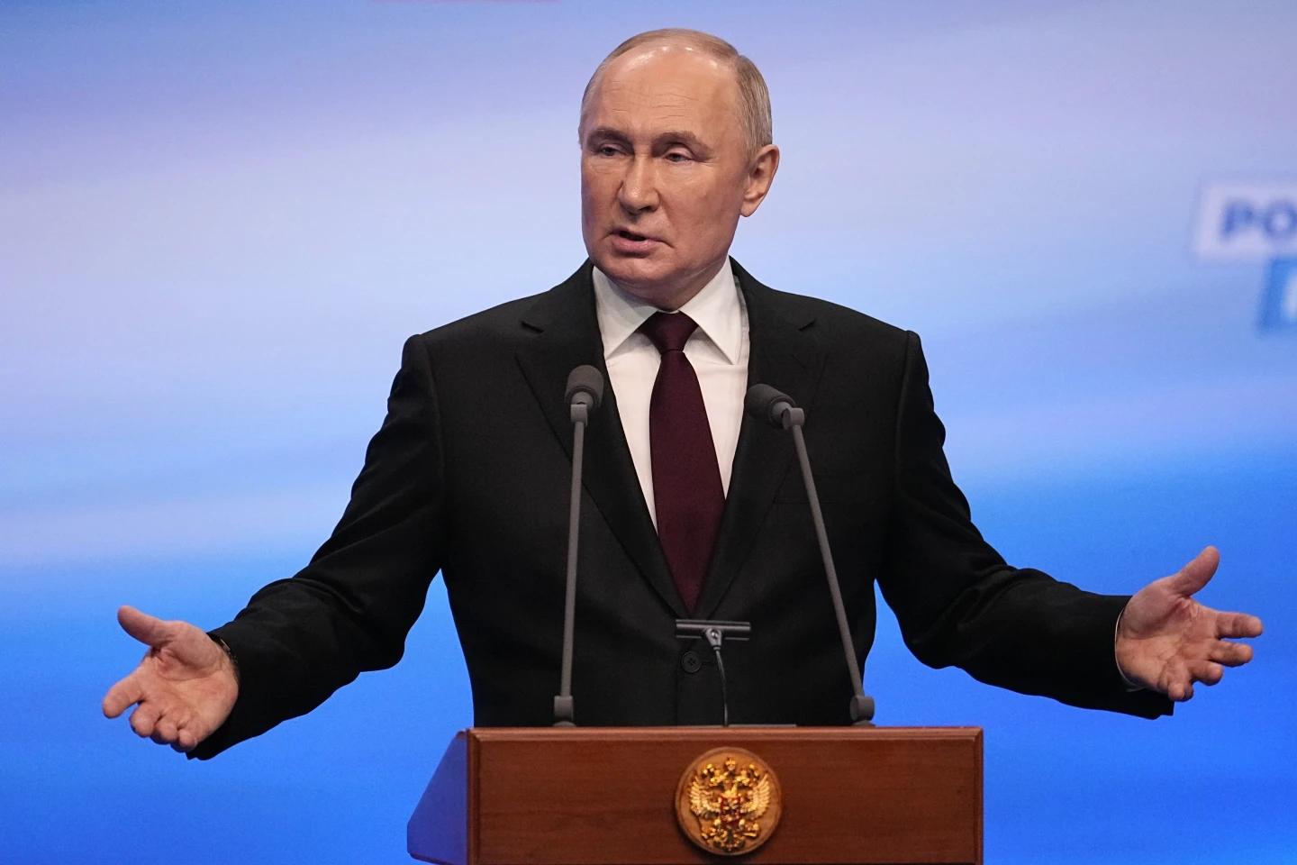 FILE - Russian President Vladimir Putin gestures while speaking on a visit to his campaign headquarters in Moscow, Russia, early on Monday, March 18, 2024, after his reelection. (AP Photo)