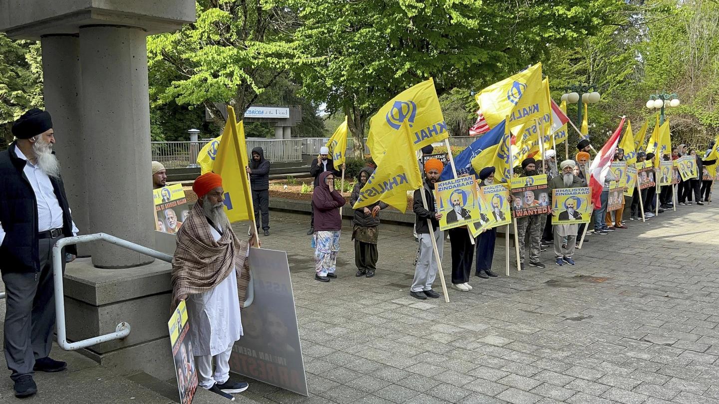 Members of British Columbia&#x27;s Sikh community gather in front of the courthouse in Surrey, British Columbia, Tuesday, May 7, 2024. (AP)