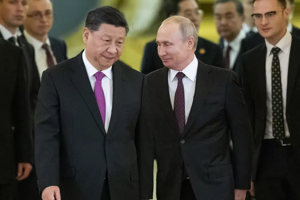FILE - Chinese President Xi Jinping, left, and Russian President Vladimir Putin enter a hall for talks in the Kremlin in Moscow, Russia, June 5, 2019. The Chinese government said Xi would visit Moscow from March 20, to March 22, 2023, but gave no indication when he departed.  AP/RSS Photo