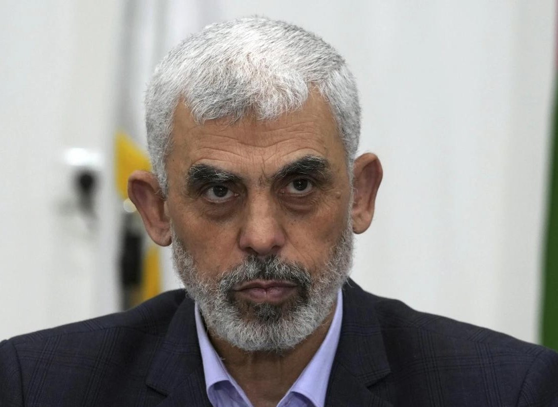 FILE - Yahya Sinwar, head of Hamas in Gaza, chairs a meeting with leaders of Palestinian factions at his office in Gaza City, on April 13, 2022. (AP Photo)