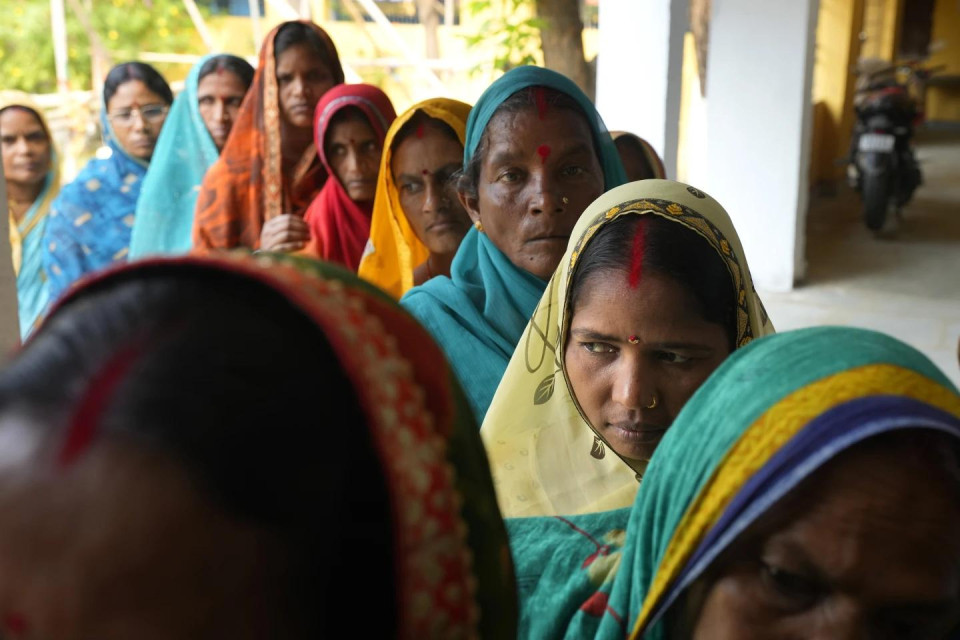 Women stand in a queue to cast their votes during the fourth phase of general election, on the outskirts of Samastipur, in the Indian state of Bihar, Monday, May 13, 2024. (AP Photo)