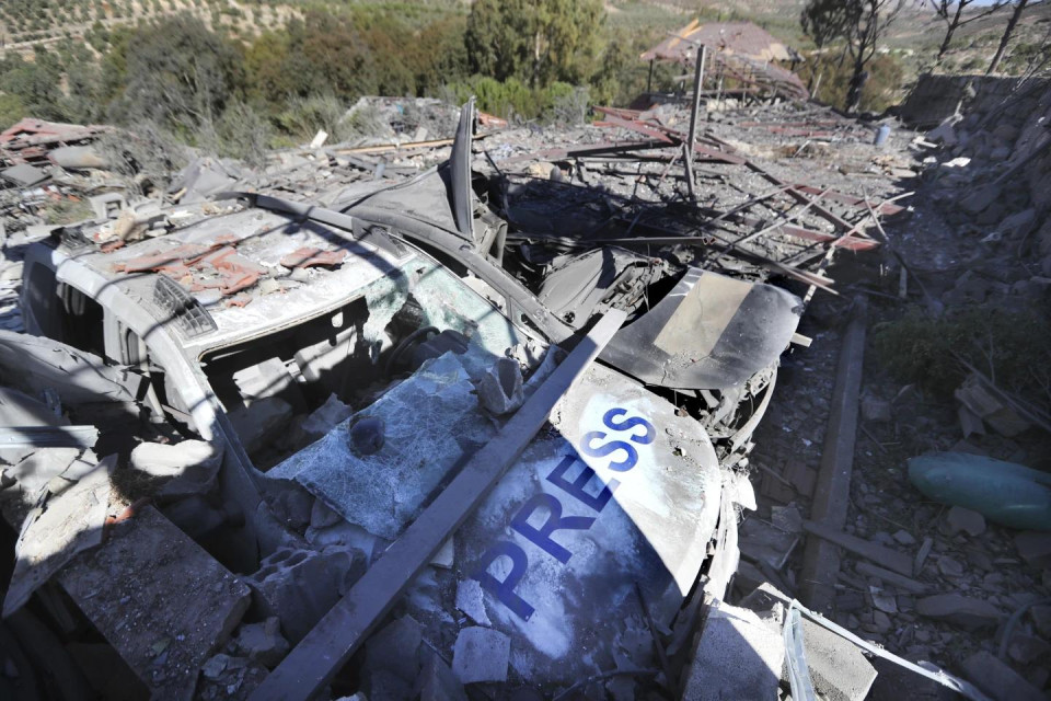 Destroyed vehicles used by journalists at the site where an Israeli airstrike hit a compound housing journalists, killing three media staffers from two different news agencies according to Lebanon’s state-run National News Agency, in Hasbaya village, southeast Lebanon, Friday, Oct. 25, 2024. (AP Photo)