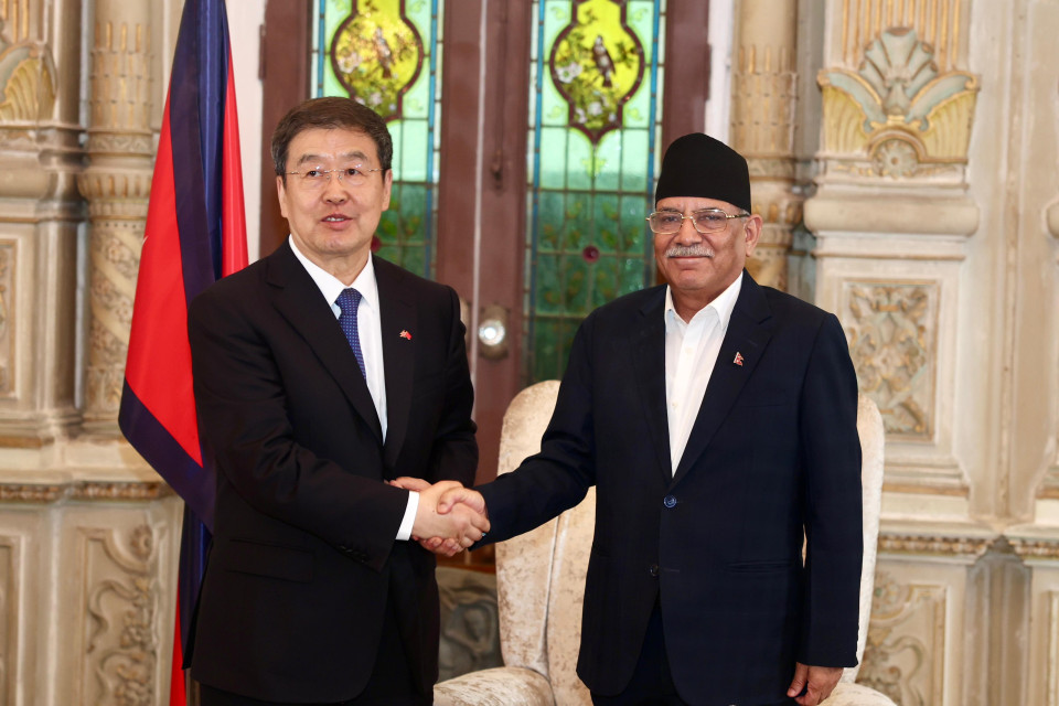 Vice-chairman of the 14th National Committee of the Chinese People's Political Consultative Conference Bater (left) and Prime Minister Pushpa Kamal Dahal. (Photo: Prime Minister's Secretariat)